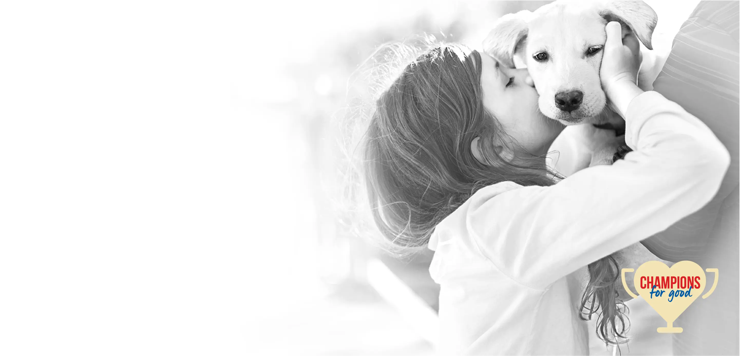 Girl kissing dog Champions For Good